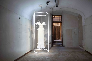 Illustration for article titled Rodarte presents evening gowns for urban warfare